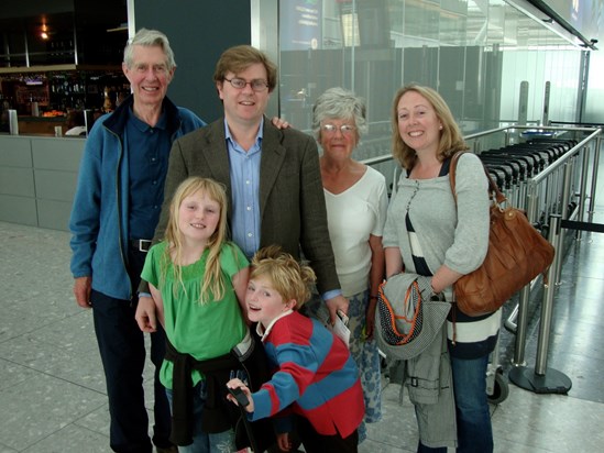 Meeting and parting   family group at airport