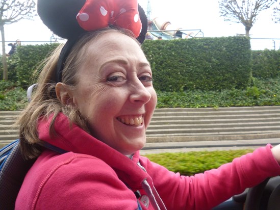 Trish with Minnie Mouse ears Disneyland