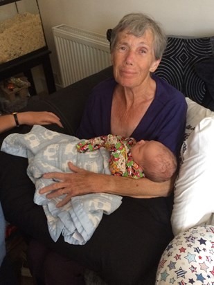 Meeting her greatgrandson Logan for the first time