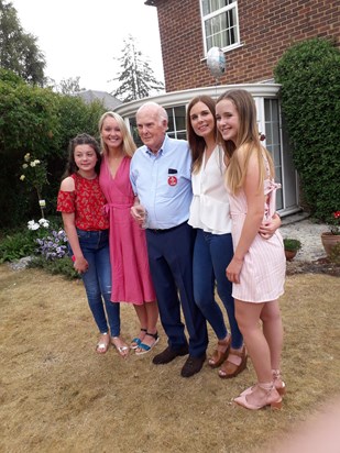 George on his 90th with his granddaughters and great-granddaughter