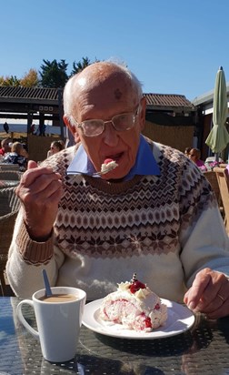 Mike tucking into a dessert