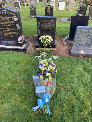 Joan’s floral tributes have been placed on Sam’s grave where Joan’s ashes will be buried at a later date.   