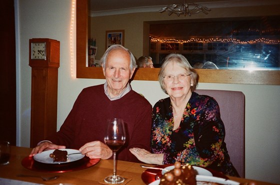 Nan and Ian enjoying some birthday cake with the Ellis Clan