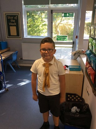 Patrick sporting a fabulous furry tie for Year 3 Stone Age day!