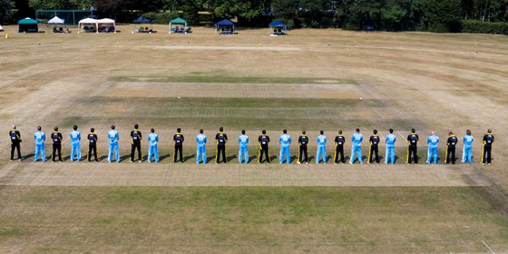 SAM POUNTNEY INAUGURAL MEMORIAL CRICKET MATCH 2020 - THE PLAYERS LOOK ON THE TENTED VILLAGE