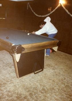 Cameron playing pool