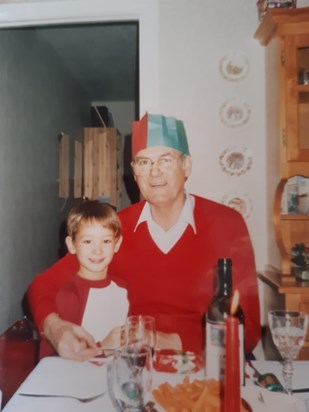 Rob with his grandad. Christmas and silly hats 😂