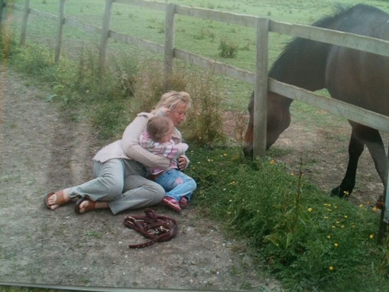 Mum having fun with her special little lady and her horse breezier.
