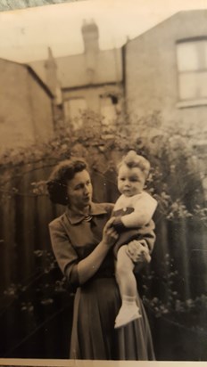 Dennis as a baby with his Mum