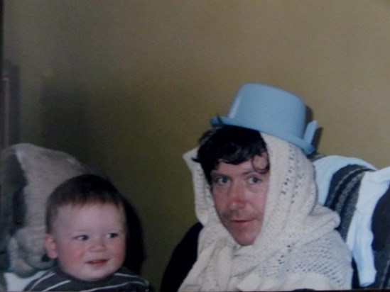 Haha Stuart and dad with pee bucket on head 