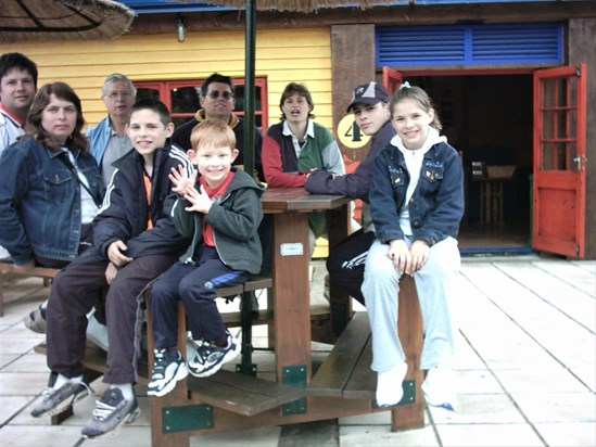 The family at Thorpe Park with Grandad