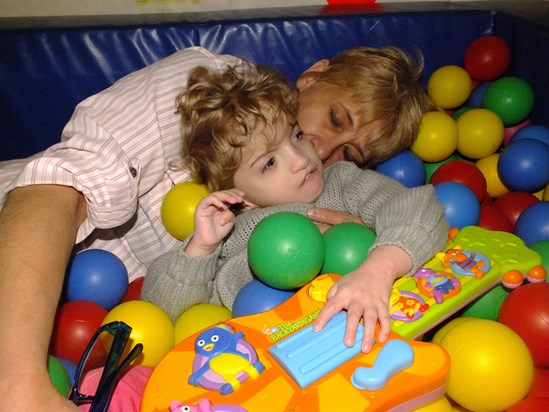 This is you and mummy you loved the ball pit and you loved that toy <3