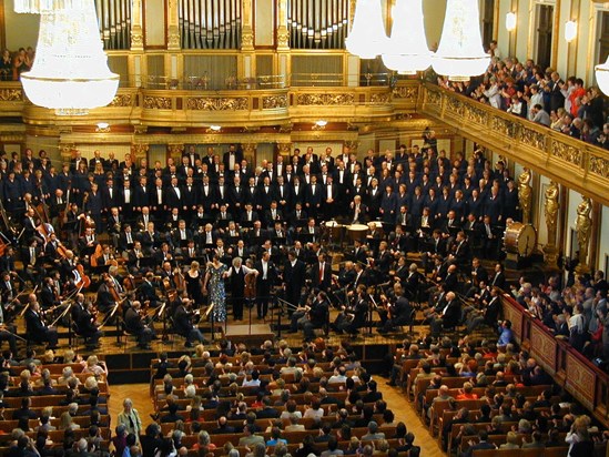 Simon Rattle and performers take a final bow after Beethoven's 9th Symphony.