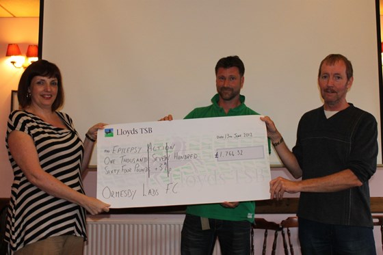 Presentation of cheque to Thomasina from Ormesby Lads FC following the 24hr marathon