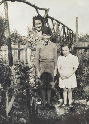 Mark with his mother Phyllis and sister Clare, 1940s.