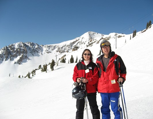 Wenbo skiing with his wife