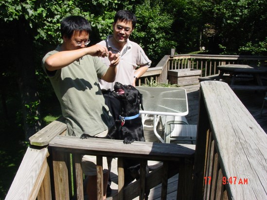 Wenbo and Qi-Man Shao at his home