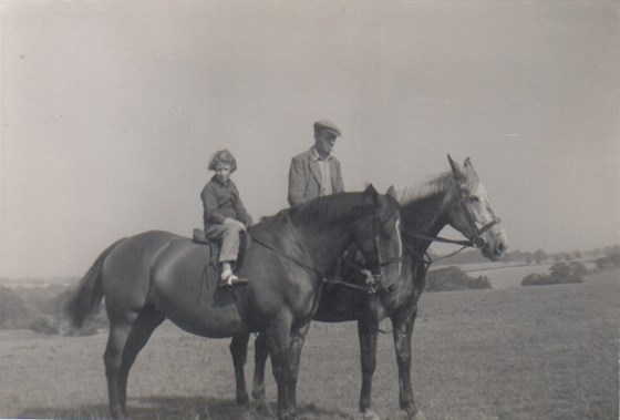 Chris on a horse with her father Harry
