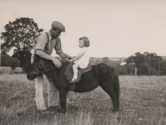 Chris on pony with her father Harry