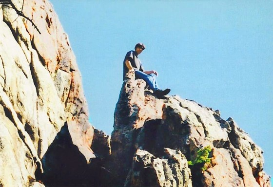 Luke perched on a rock
