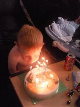 JJ blowing out the candles 