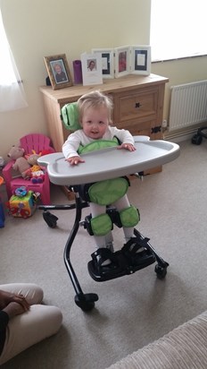 In her stander