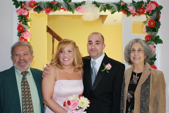 Nick with his parents on his wedding day