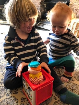 8little John showing Georgie the jack in the box you bought for Hattie and Jonny 40 years ago