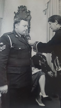 David receiving his BEM from the British Ambassador to Germany, 1983