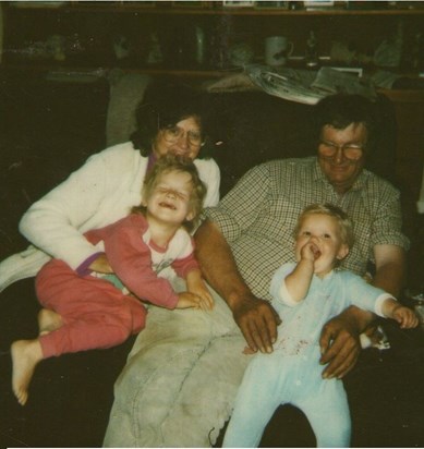 bill with his wife and grandchildren
