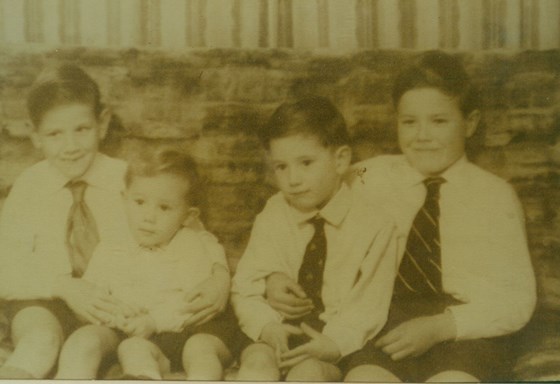 Colin, 3rd from left, with his three brothers