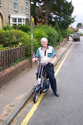 Bob on his e-scooter - July 2003