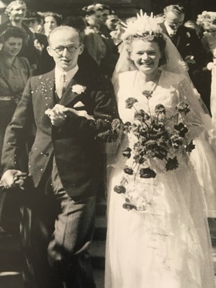 Dad looking very pleased with himself with his beautiful bride