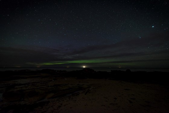 Northern Lights, with a multitude of stars in the distance, Covesea