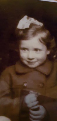 Mary Gillian aged 3 years with a pretty bow