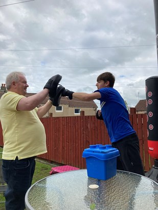 Dad teaching Jnr some boxing skills