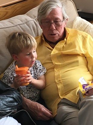 Monty and Grandpa share chocolate