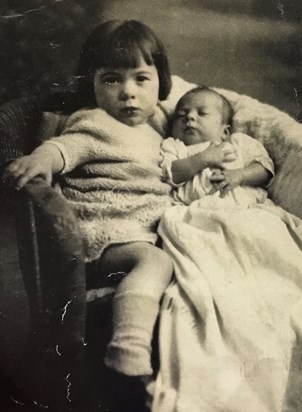 Baby Lou with his big sister.