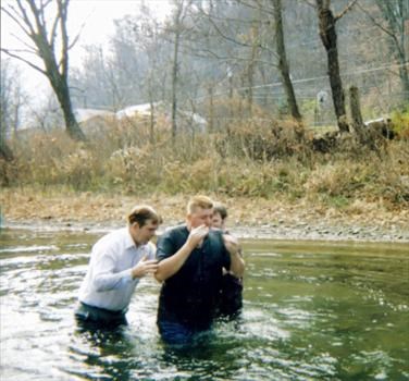 Dad & John baptizing Donnie