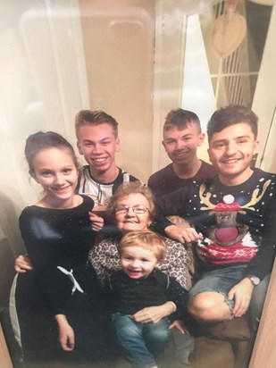 Barbara with her grandchildren taken Christmas 2019
