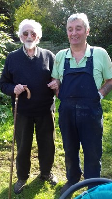 Dad and William Clugston with the new rose arch at the top of the yard