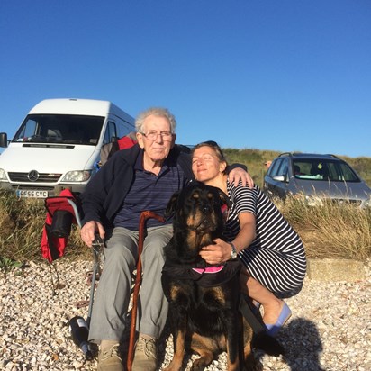 Dad on beach with Nikki and Runa