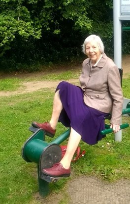 Mother working out at the park in Bovey Tracey, Devon