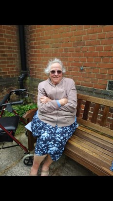 Mum sitting outside church on her favourite bench during lockdown 