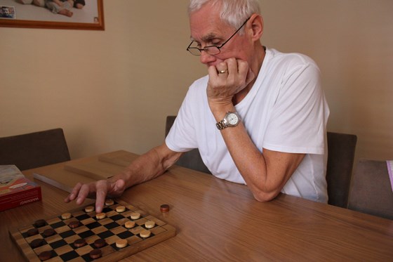 Playing Draughts with his grandson Ryan