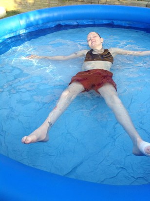 Relaxing in the paddling pool 