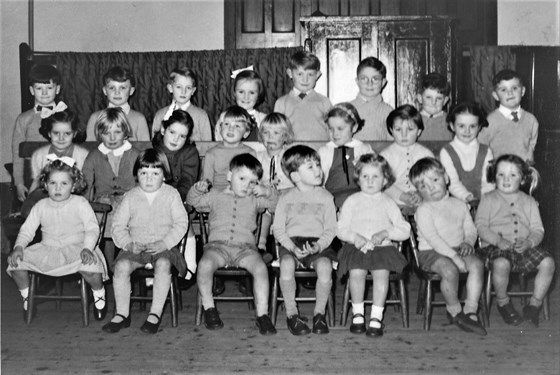 Fore St. Church SS Christmas party 1958. Viv back left, Tom back middle, Alan front (tired).