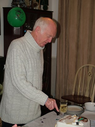 Roland at 80 years young cutting the cake