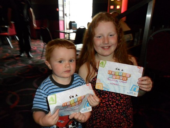 Cameron with his big Sister winning certificates on holiday !!