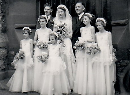 Vivian and Sylvia as bridesmaids at Jean & Ron's wedding in 1954.